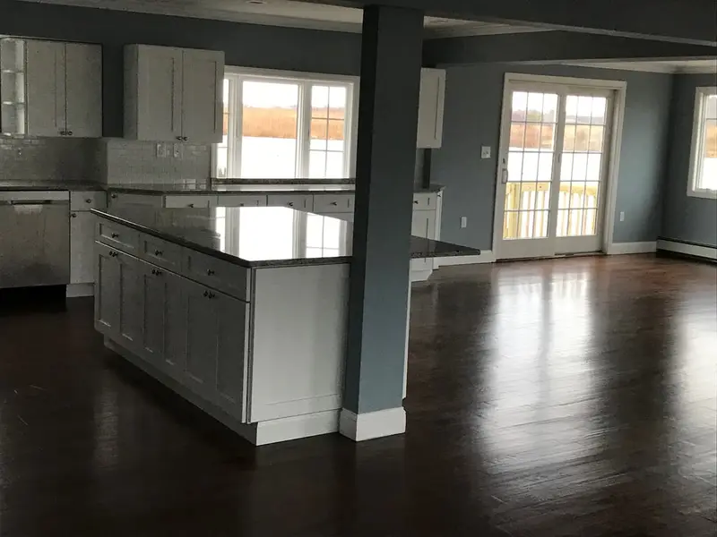 Finished kitchen island with dark wood floors, Amityville, NY